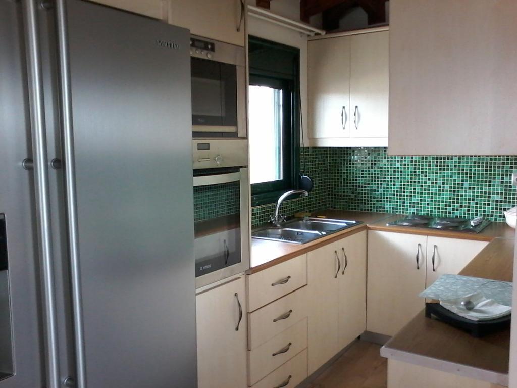 Artemis Sunrise Apartment Luaran gambar